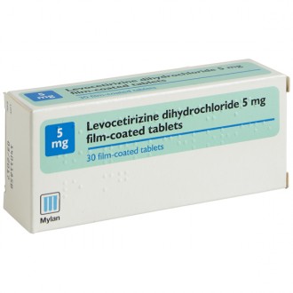 Blister pack of Levocetirizine 5mg tablets from Cured Pharmacy, showing medication packaging on a white background.