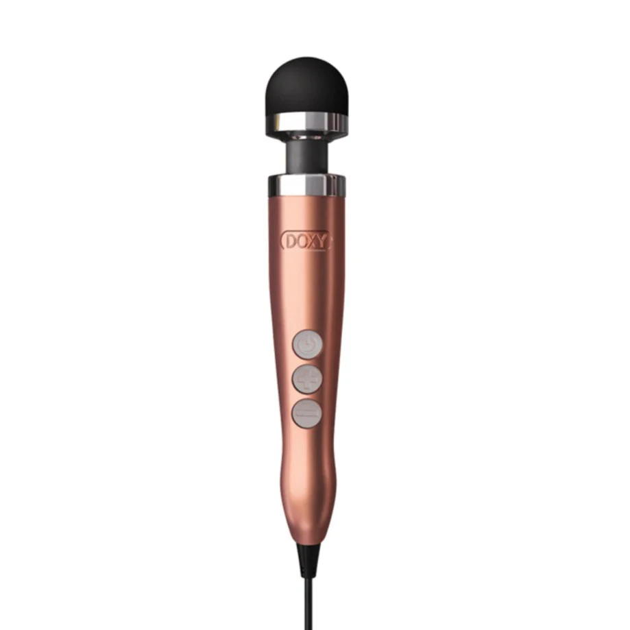 Doxy Die Cast 3 vibrator in rose gold with sleek metallic finish, showcasing its smooth design and compact size.