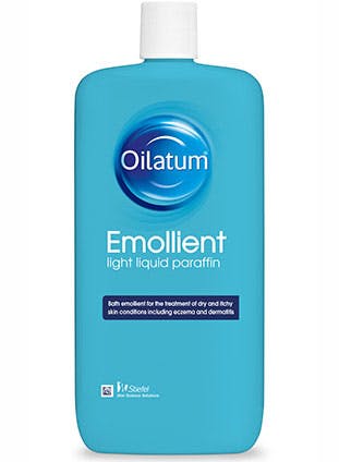 Bottle of Oilatum Eczema Dry Skin Bath Additive Emollient 500ml with label showing product details and branding.