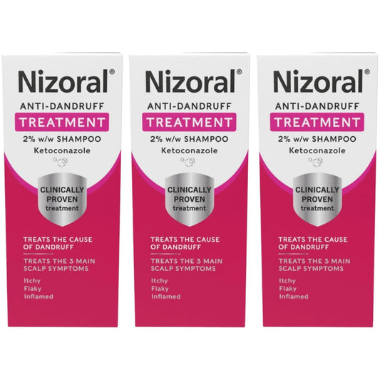 Nizoral anti-dandruff shampoo 100ml bottle with label, displayed alongside two additional shampoo bottles on a neutral background.