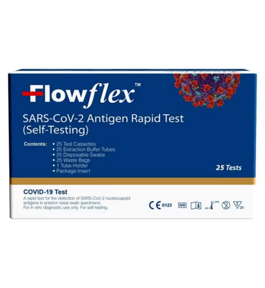 Flowflex antigen rapid test kit by CuredPharmacy showing lateral flow test device with test strip and packaging.