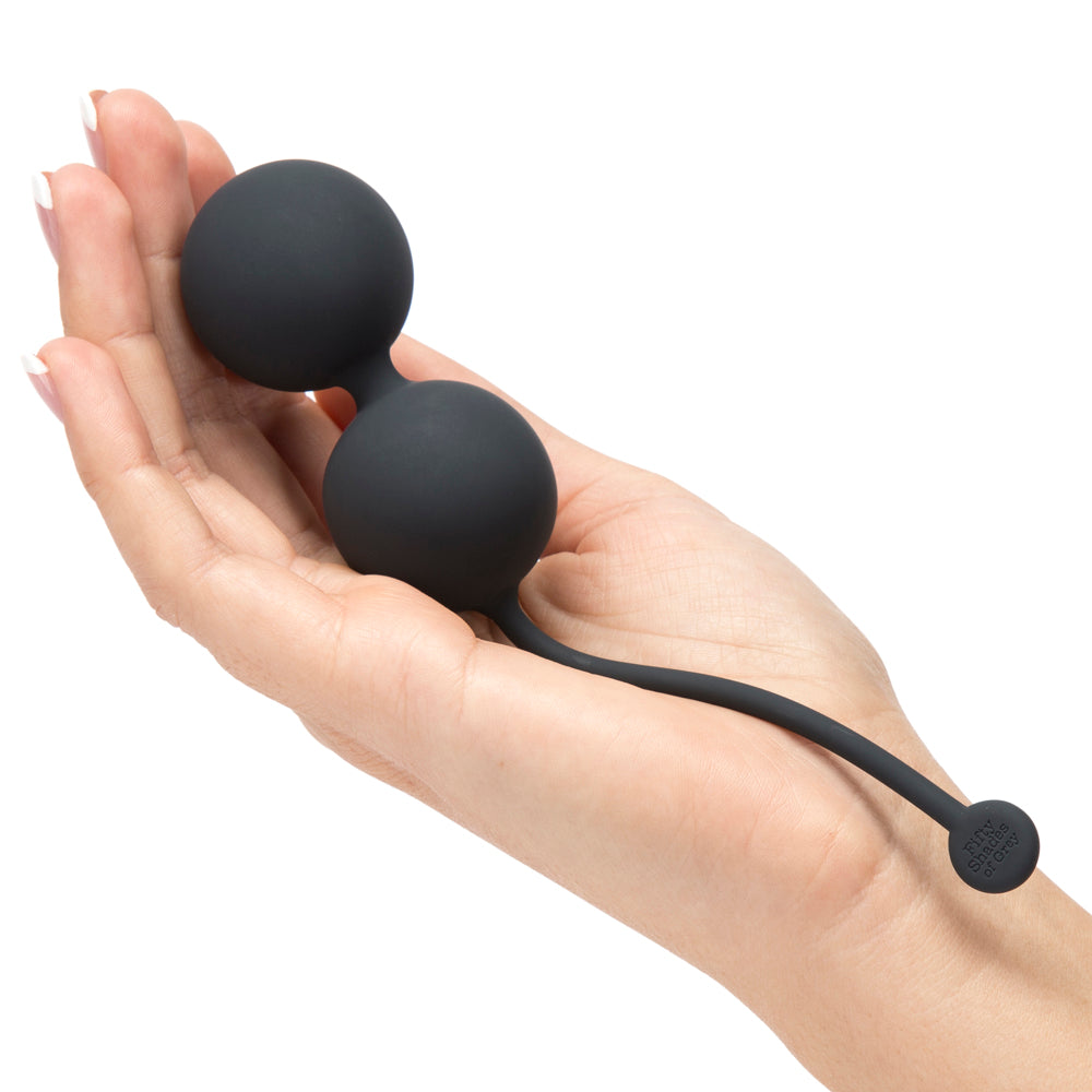 Fifty Shades of Grey tighten and tense silicone jiggle balls displayed in clear packaging with product details visible.