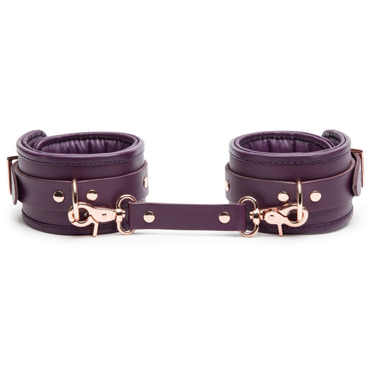 Fifty Shades Freed Cherished Collection leather ankle cuffs with metal hardware, designed for restraint and BDSM role-play.