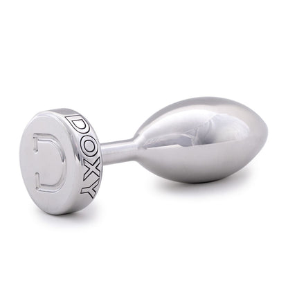 Doxy Smooth Butt Plug in black with rounded tip and flared base, made of smooth, body-safe material for comfortable use.