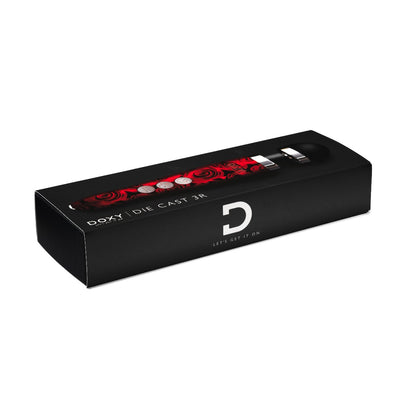 Doxy Die Cast 3 Rechargeable vibrator in roses design, showcasing its sleek, metallic finish and ergonomic shape for pleasure.