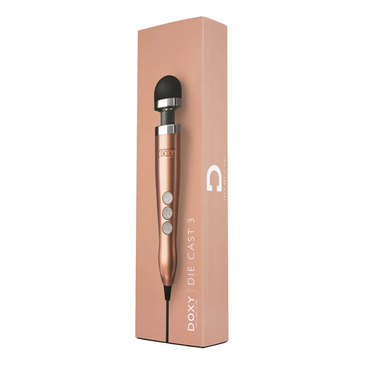 Doxy Die Cast 3 rose gold vibrator with sleek design and smooth surface, showcasing its compact and modern shape.