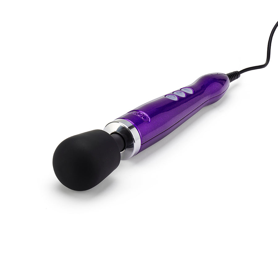 Doxy Die Cast purple vibrator with textured surface, made of high-quality material, shown on a clean white background.