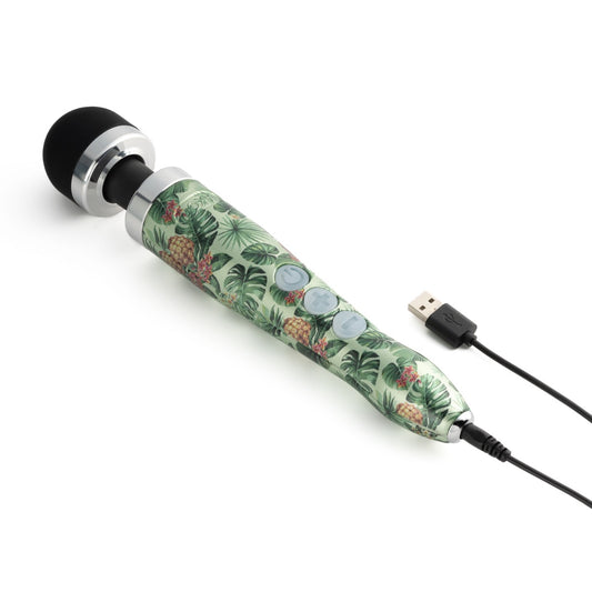 Doxy Die Cast 3 Rechargeable vibrator with pineapple hydrographic design, compact black body, and USB charging port.