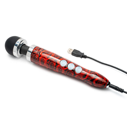 Doxy Die Cast 3 Rechargeable vibrator with rose design, showing the sleek body and charging cable for the Doxy brand.