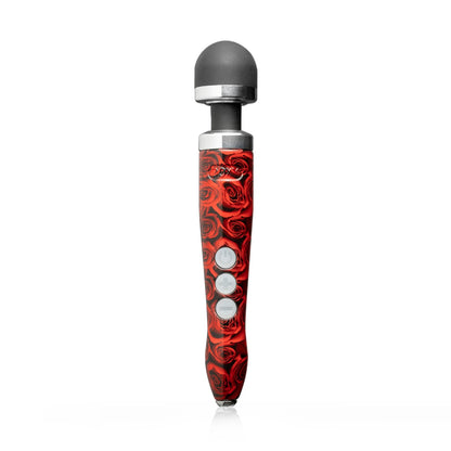 Doxy Die Cast 3 Rechargeable vibrator with rose gold finish standing upright, showcasing its sleek design and textured surface.