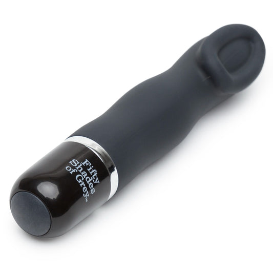 Fifty Shades of Grey Sweet Touch Mini Clitoral Vibrator, compact and discreet personal pleasure device with textured surface.