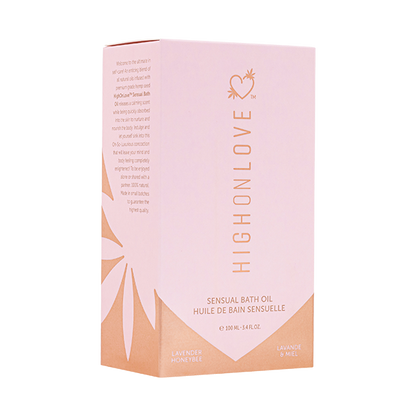 Lavender Honeybee bath oil by High On Love in a clear bottle with lavender flowers and honeybee illustration.