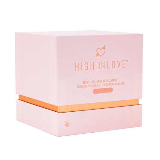 High On Love massage candle in a decorative box, featuring a luxurious soy wax formula for sensual massage and relaxation.