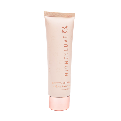 High On Love soft touch hand cream tube showing smooth, creamy texture and elegant packaging for nourishing hand care.