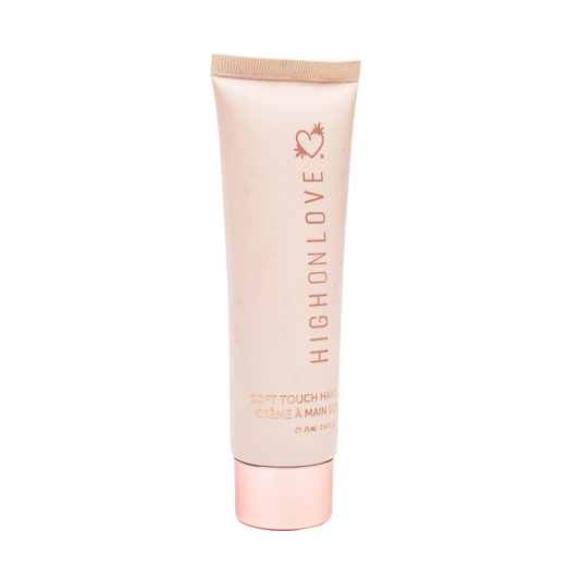 High On Love soft touch hand cream tube showing smooth, creamy texture and elegant packaging for nourishing hand care.