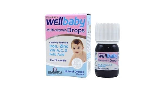 Wellbaby Multivitamin Drops in a 30ml bottle, containing colorful liquid supplement for infants and young children.